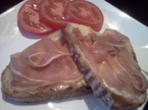 Dinner tonight - I toasted the bread and topped it with brie and proschiutto, with tomatoes on the side.  Yummy!!!